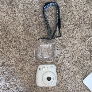 Instax whire camera with clear case and strap